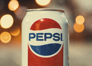 Pepsi can on gray surface