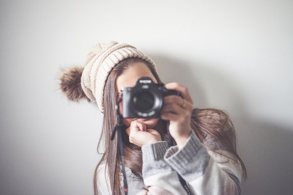 woman holding camera