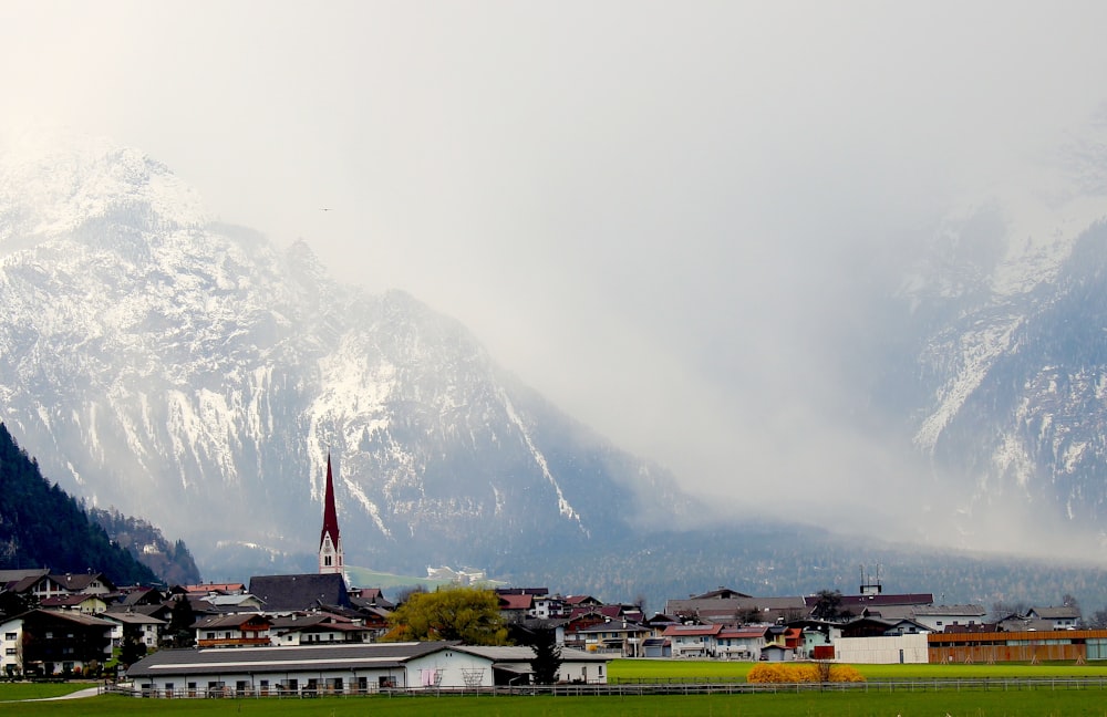 white and brown houses near mountains