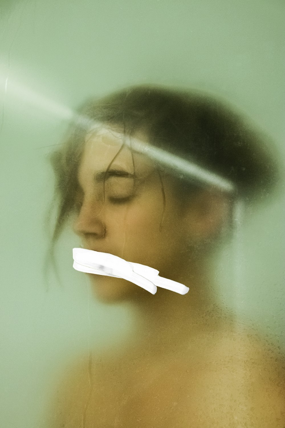 topless person taking bath in shower