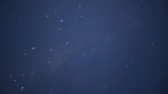 A dark blue night sky filled with bright white stars forming a commanding general's insignia.