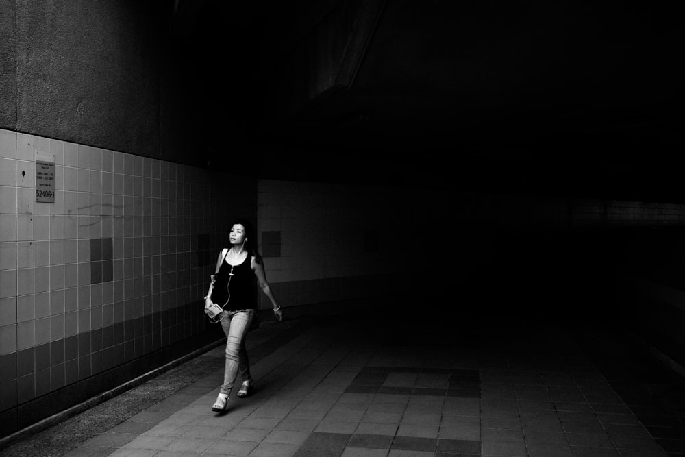 grayscale photo of girl wearing tank top