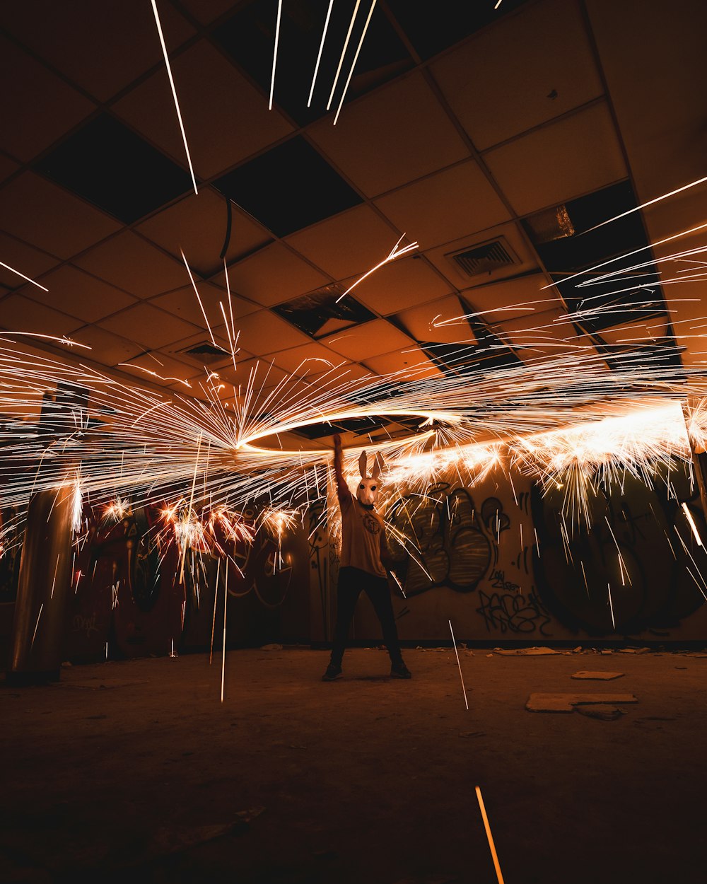 man holding steel wool in room