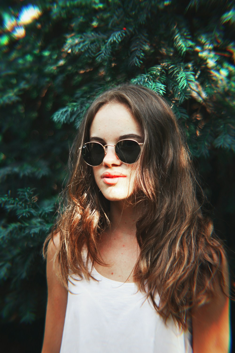 woman wearing black sunglasses