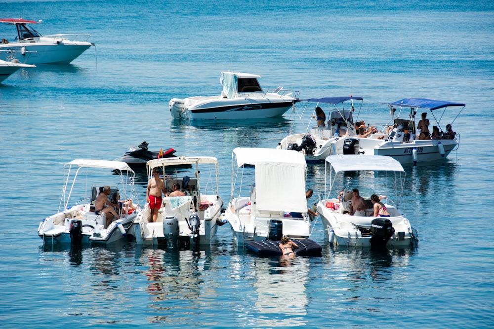 speedboats on body of water during daytime