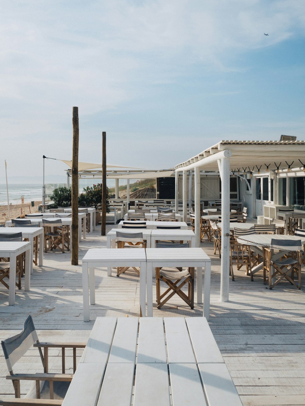 white dining tables outdoors