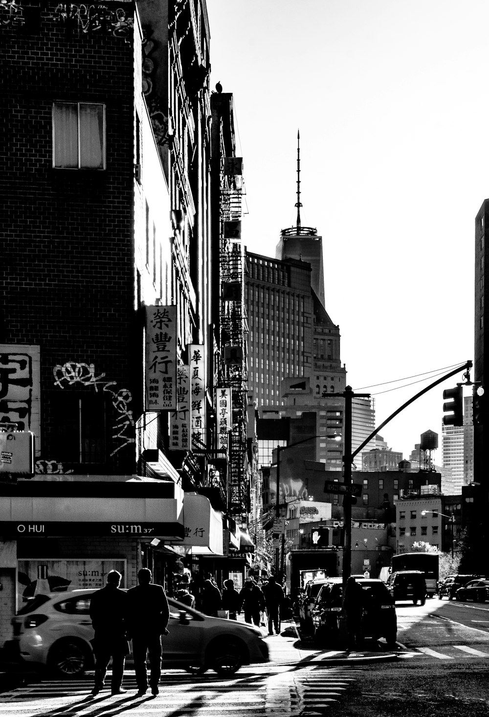 grayscale photo of high-rise buildings