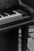 Close-up of a vintage grand piano soundboard showing fine grain of slow-grown Sitka spruce.