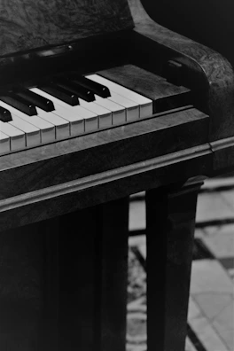 Close-up of a vintage grand piano soundboard showing fine grain of slow-grown Sitka spruce.