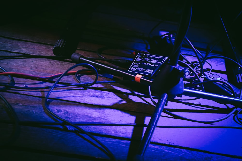 low-light photo of black microphone stand