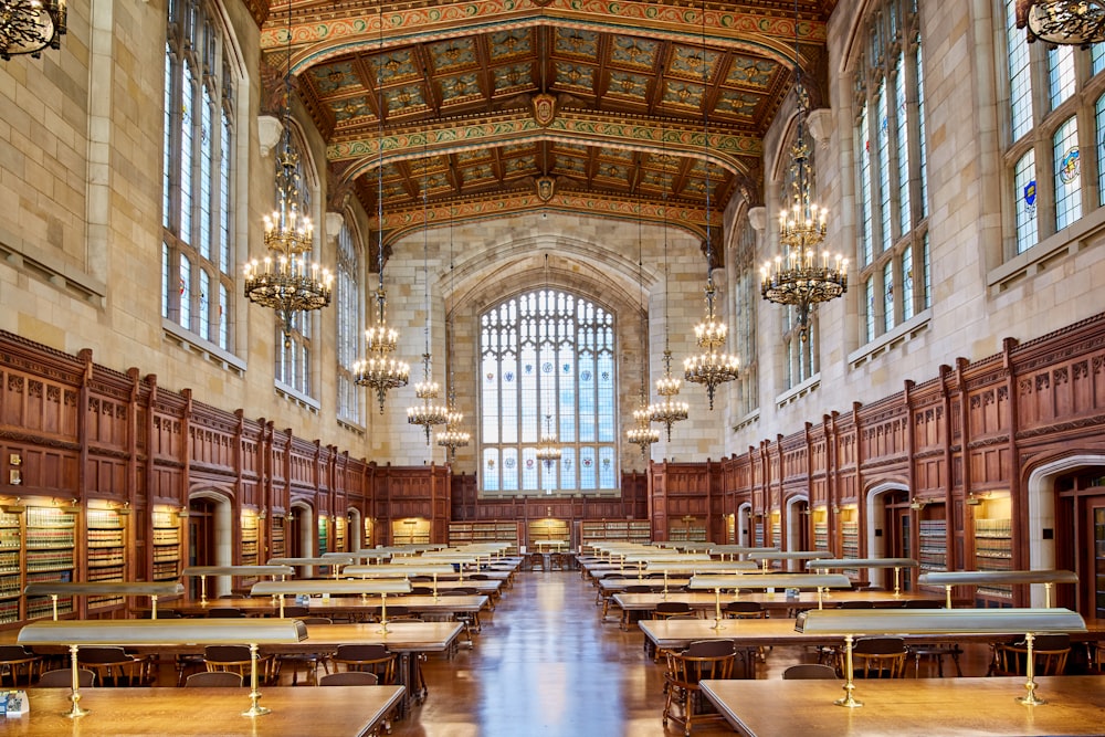 building interior with chandeliers and desks