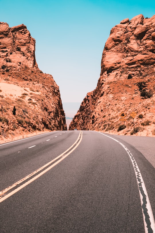 road in between on rock formation in Arizona United States