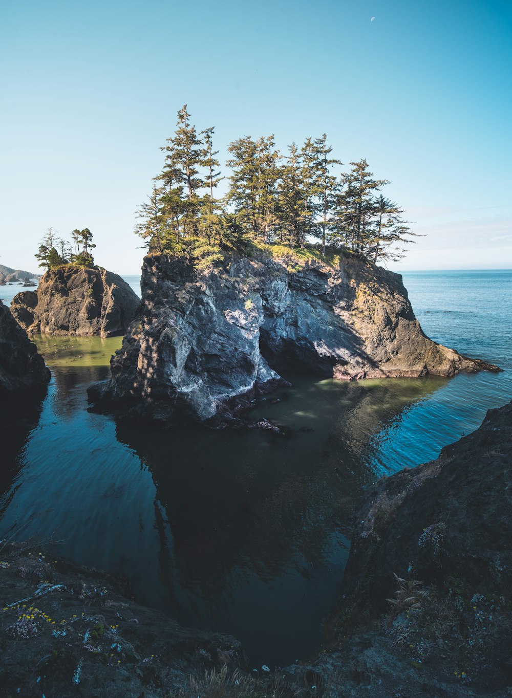 rock formation on body of water