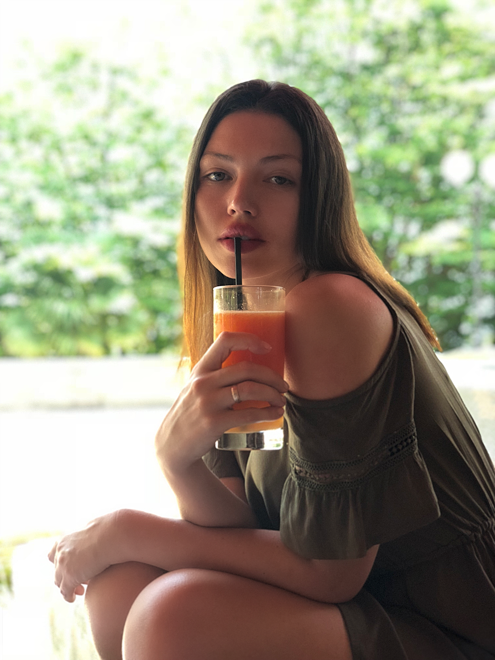 woman drinking juice