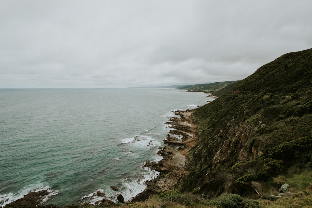 landscape photography of green mountain