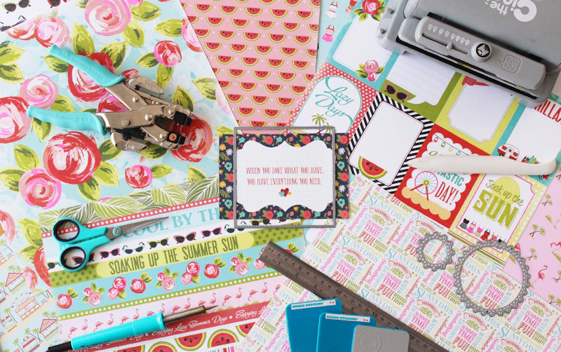 Craft supplies and scissors for making DIY photo magnets at home