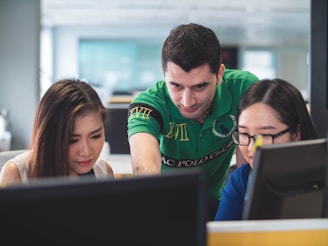 two women and one man on computer screen