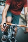 man riding black and gray bicycle photo