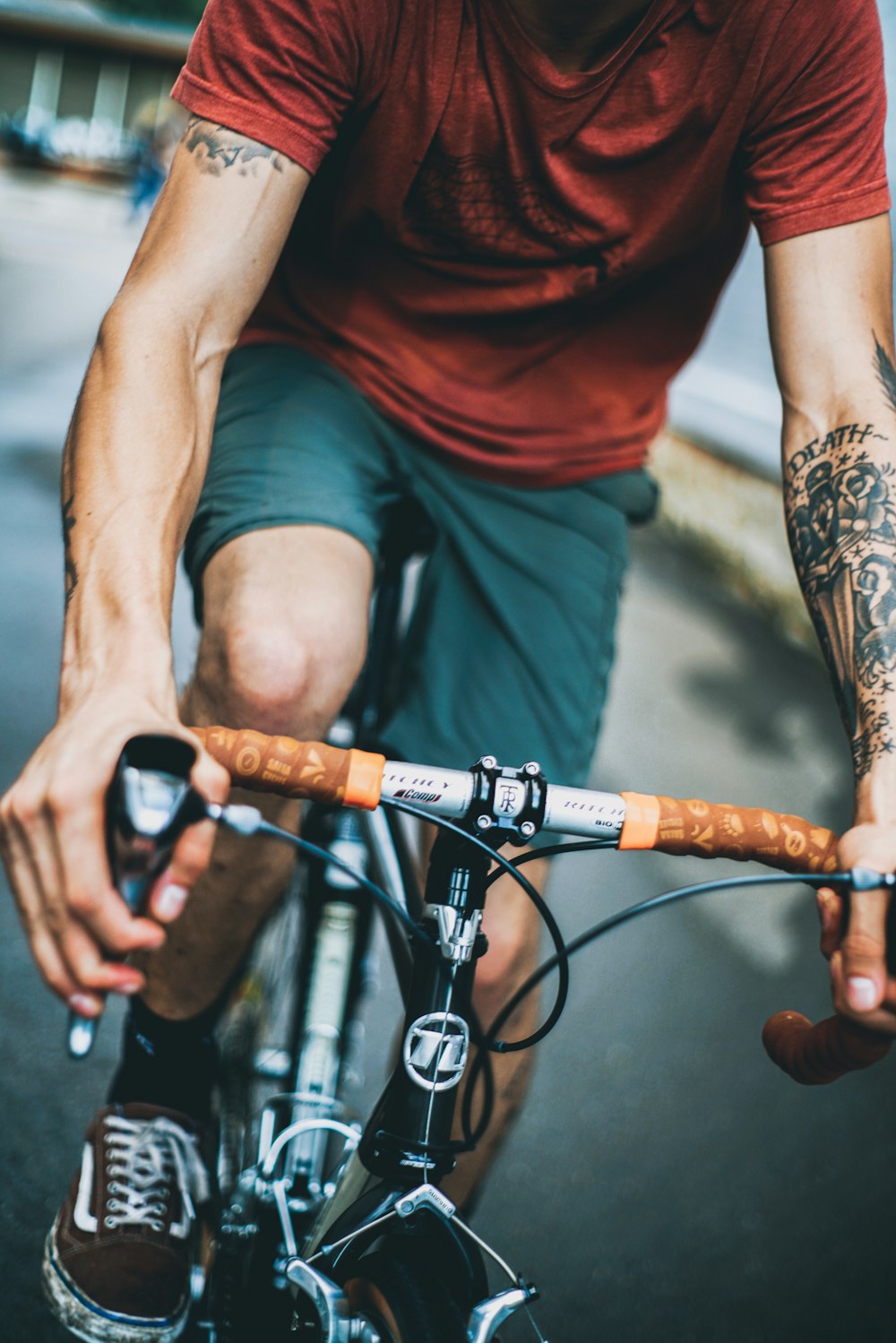 man riding black and gray bicycle photo