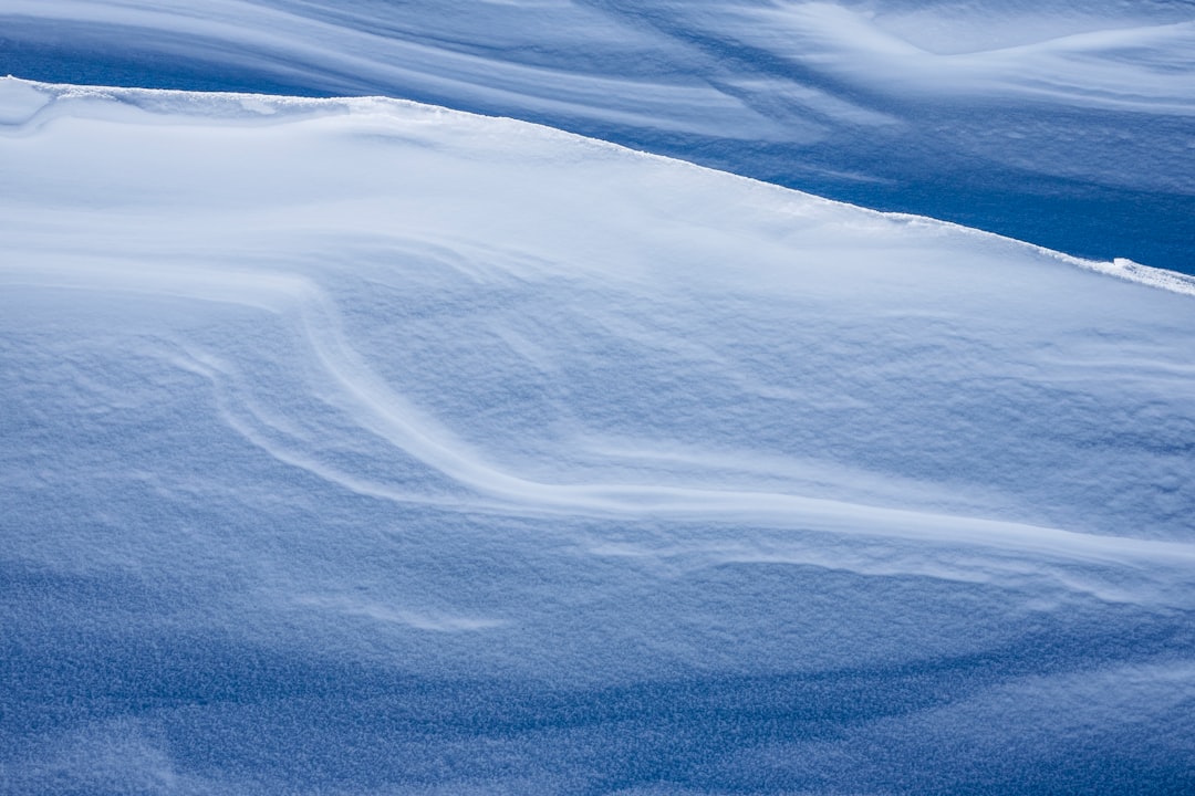bird's-eye view photo of landscape field covered by snow
