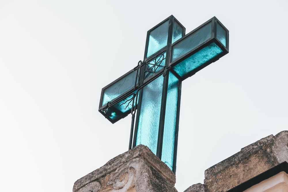 black metal frame glass cross decor