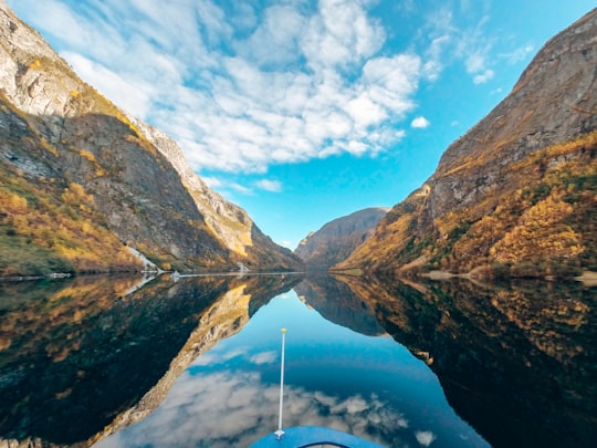body of water surrounded by rocky mountains in Nærøyfjord Norway