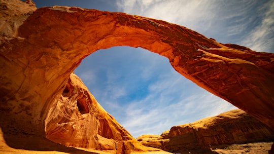 worm's eye view of forming rock in Corona Arch Trailhead United States