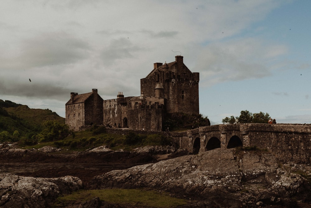 brown castle during cloudy day