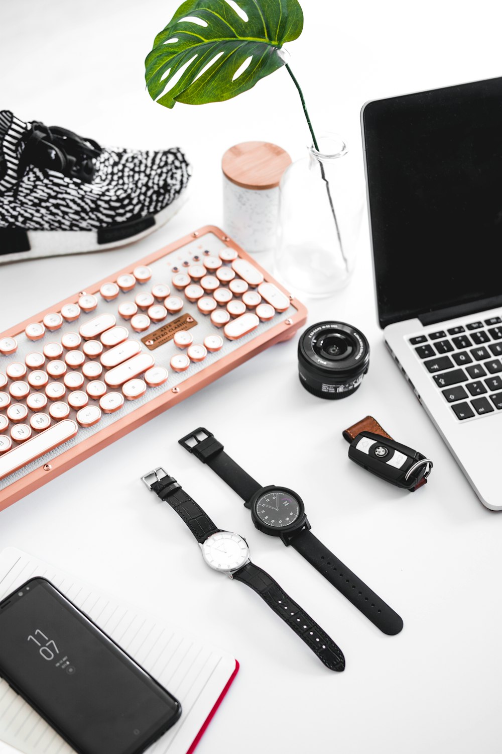 two round black analog watches