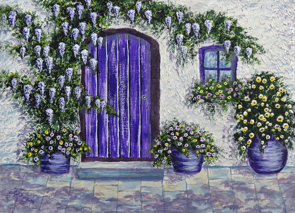 紫色のドアの絵が描かれた白い家