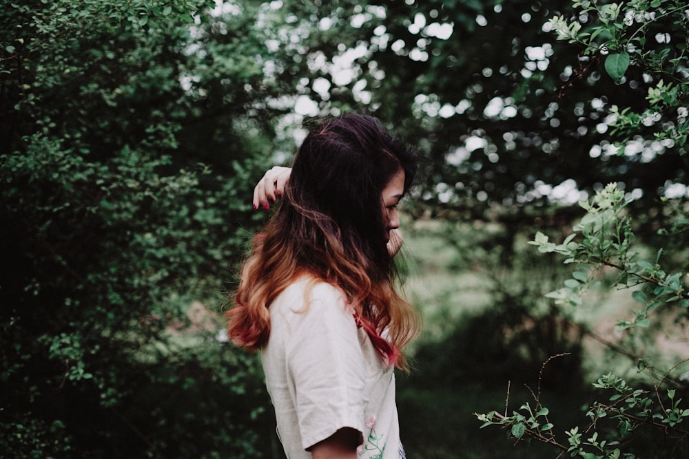 woman staring at the plants