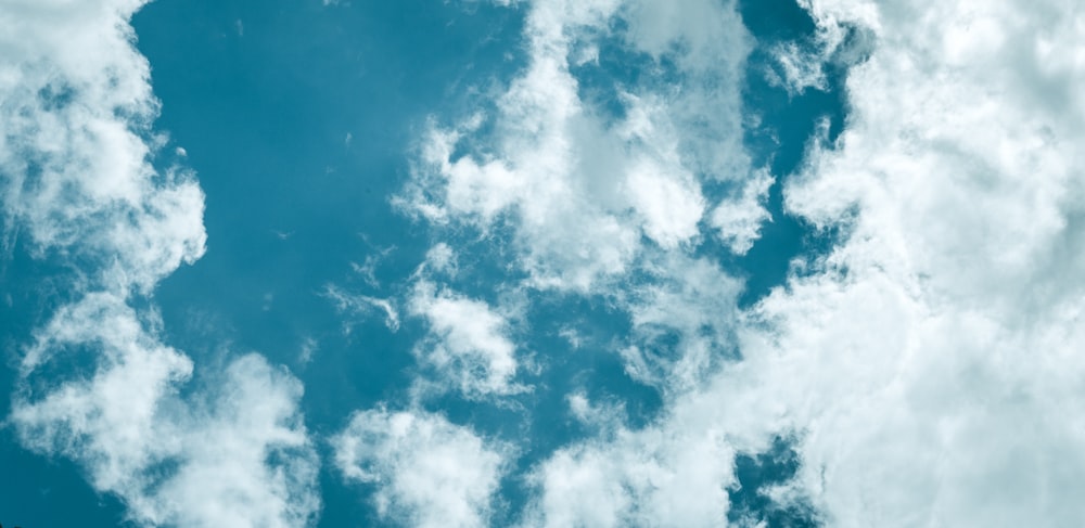 low angle photo of clouds and sky