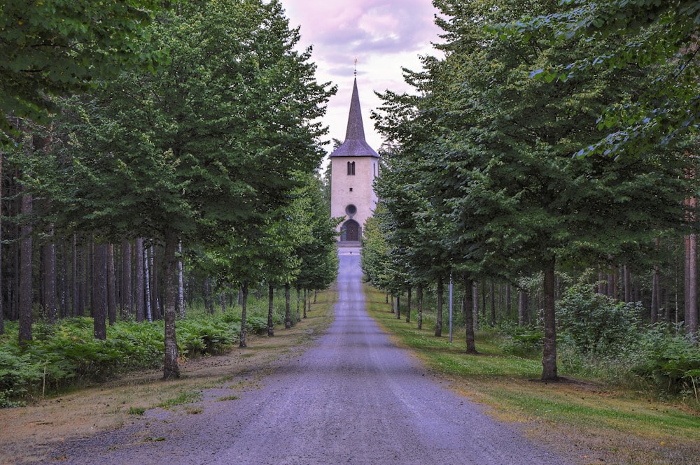 brown tower near forest during daytitme