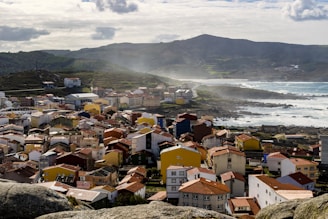 Scenic view of Stanley town with its colorful houses and rugged coastline.