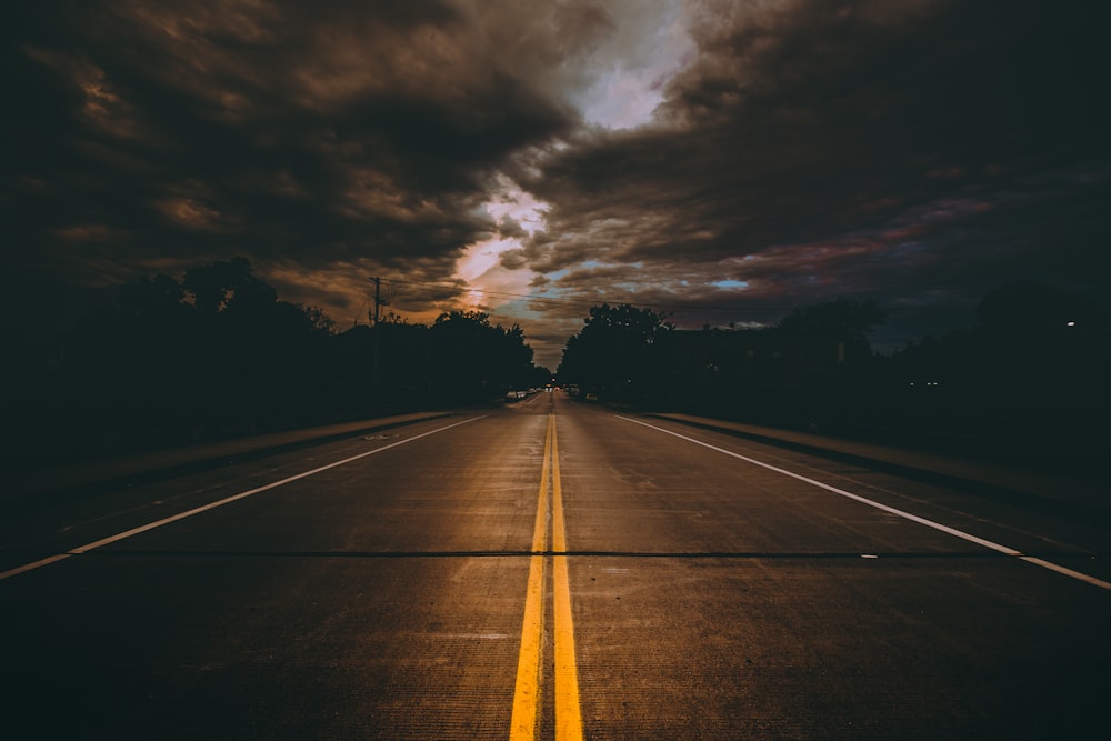 brown concrete road during daytime