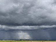 Radar image capturing a rainstorm moving across Belgium with clear precipitation zones.