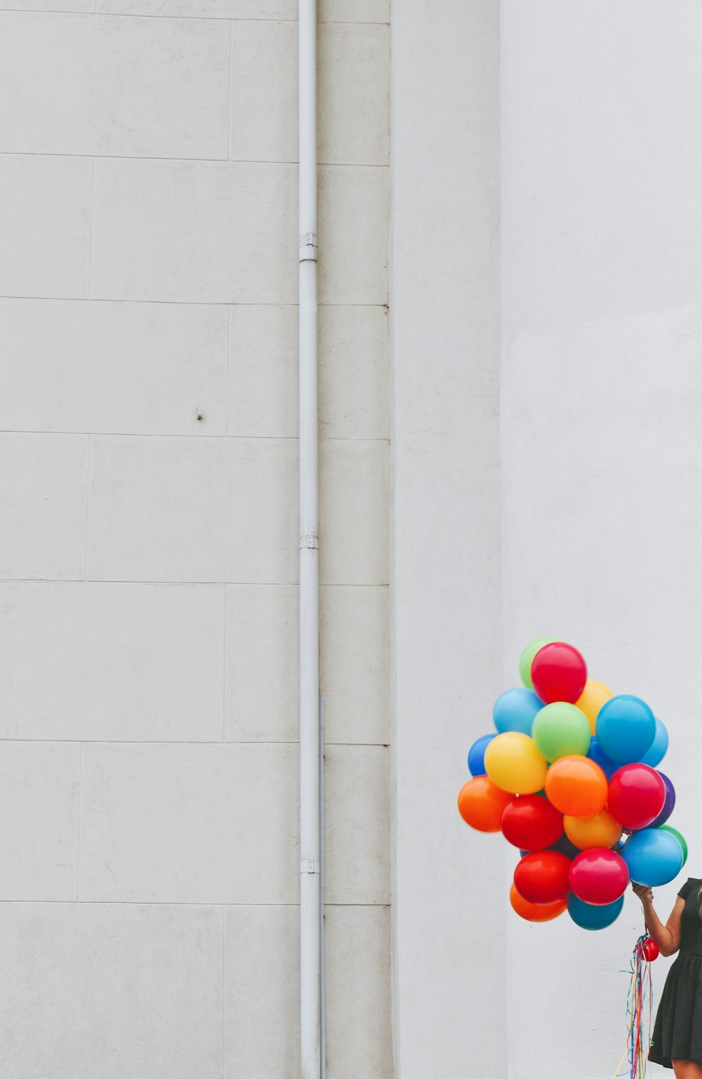 woman holding balloons