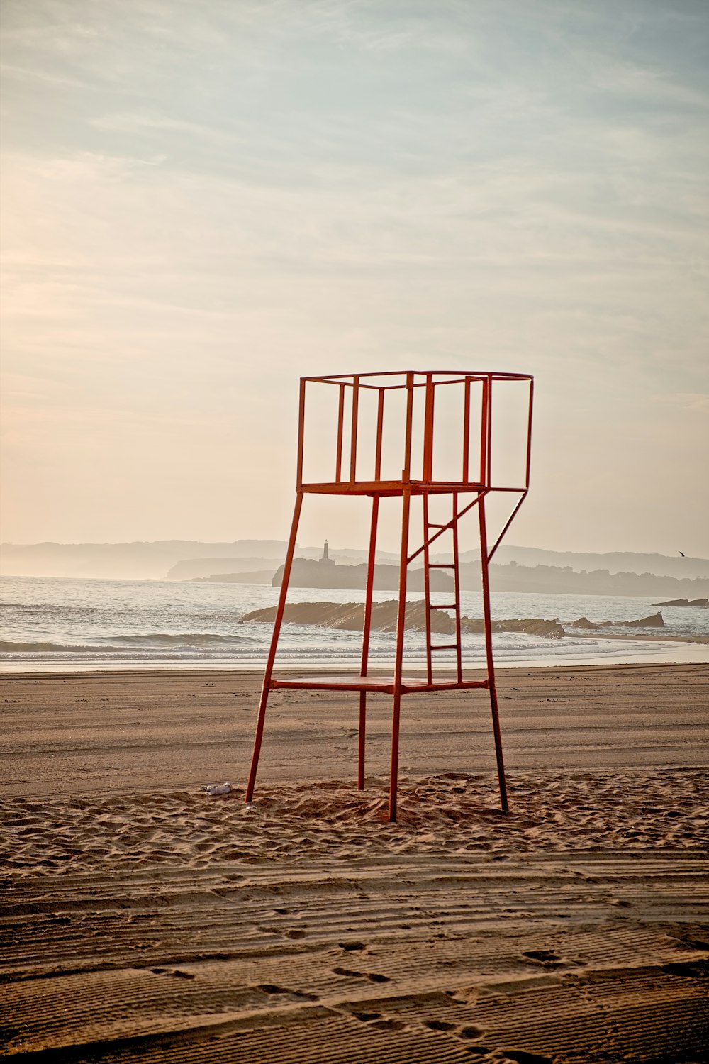 red metal lifeguard platform