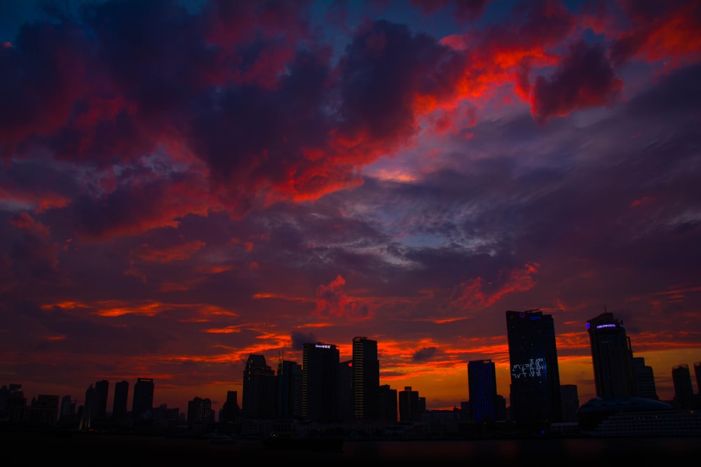 silhouette of high rise buildings during golden hour