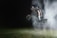 A dynamic sports action shot capturing an athlete in mid-air during a competition.