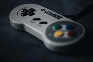 SNES controller on black surface