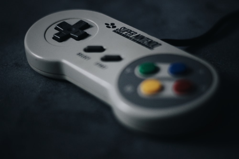 SNES controller on black surface