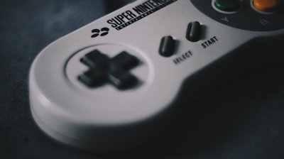 selective focus photography of SNES controller