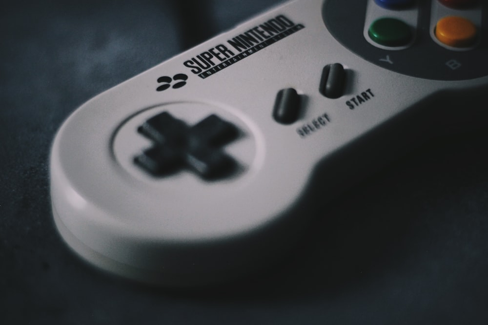 selective focus photography of SNES controller