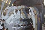 Close-up of a detailed metal sculpture with sharp laser-cut patterns.