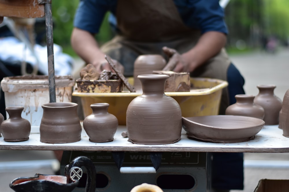 several clay vase molds