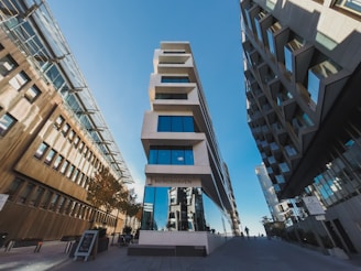 white and pink concrete buildings low-angle photography during daytime