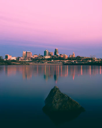 high-rise buildings against pink sky