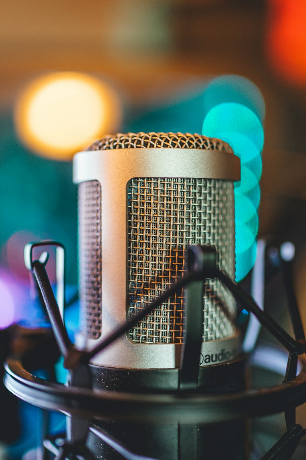 bokeh photo of gray Audio-Technica condenser microphone