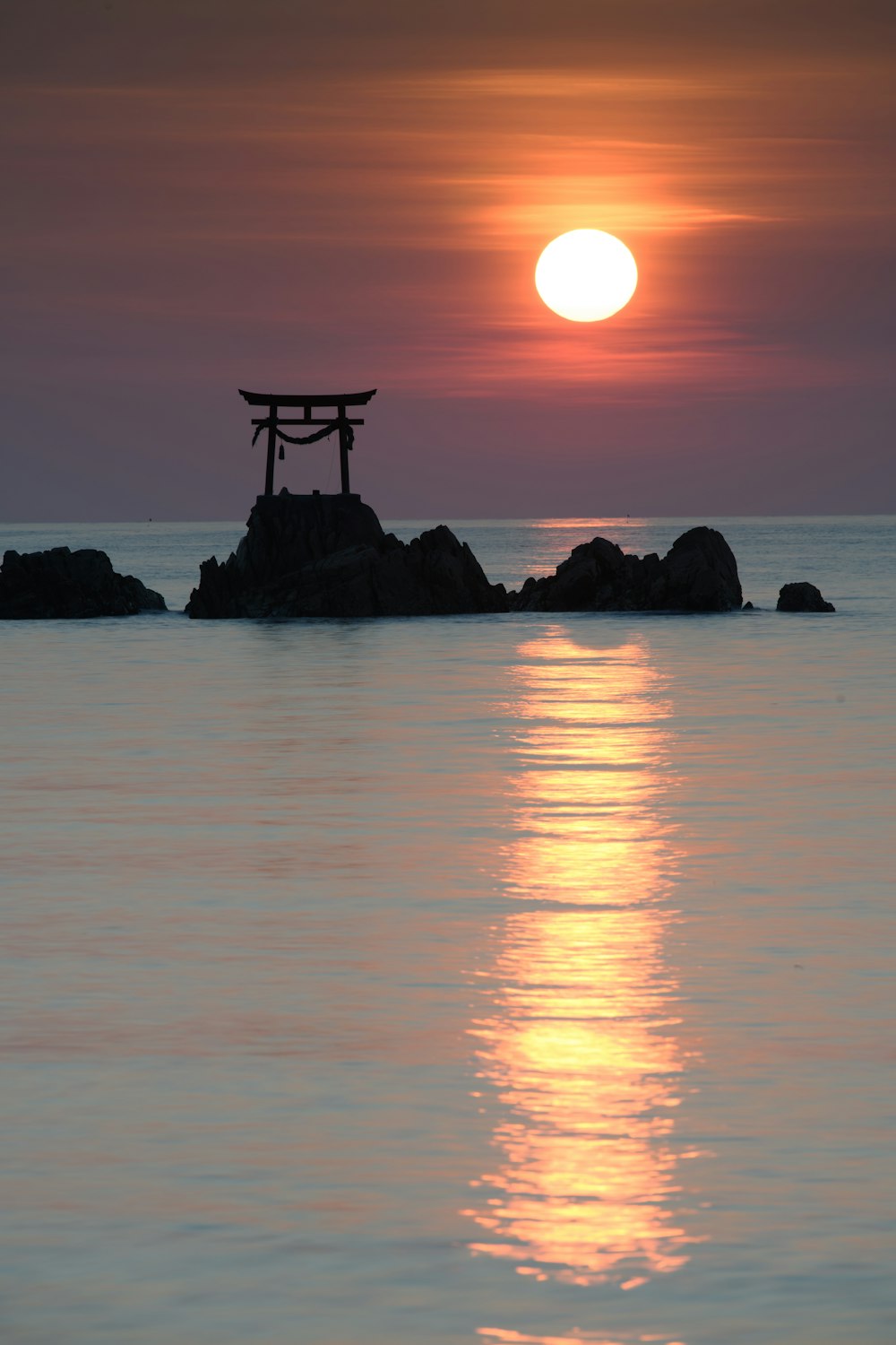 Itsukushima Shrine in middle of body of water